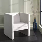 Poltrona in velluto con struttura in legno